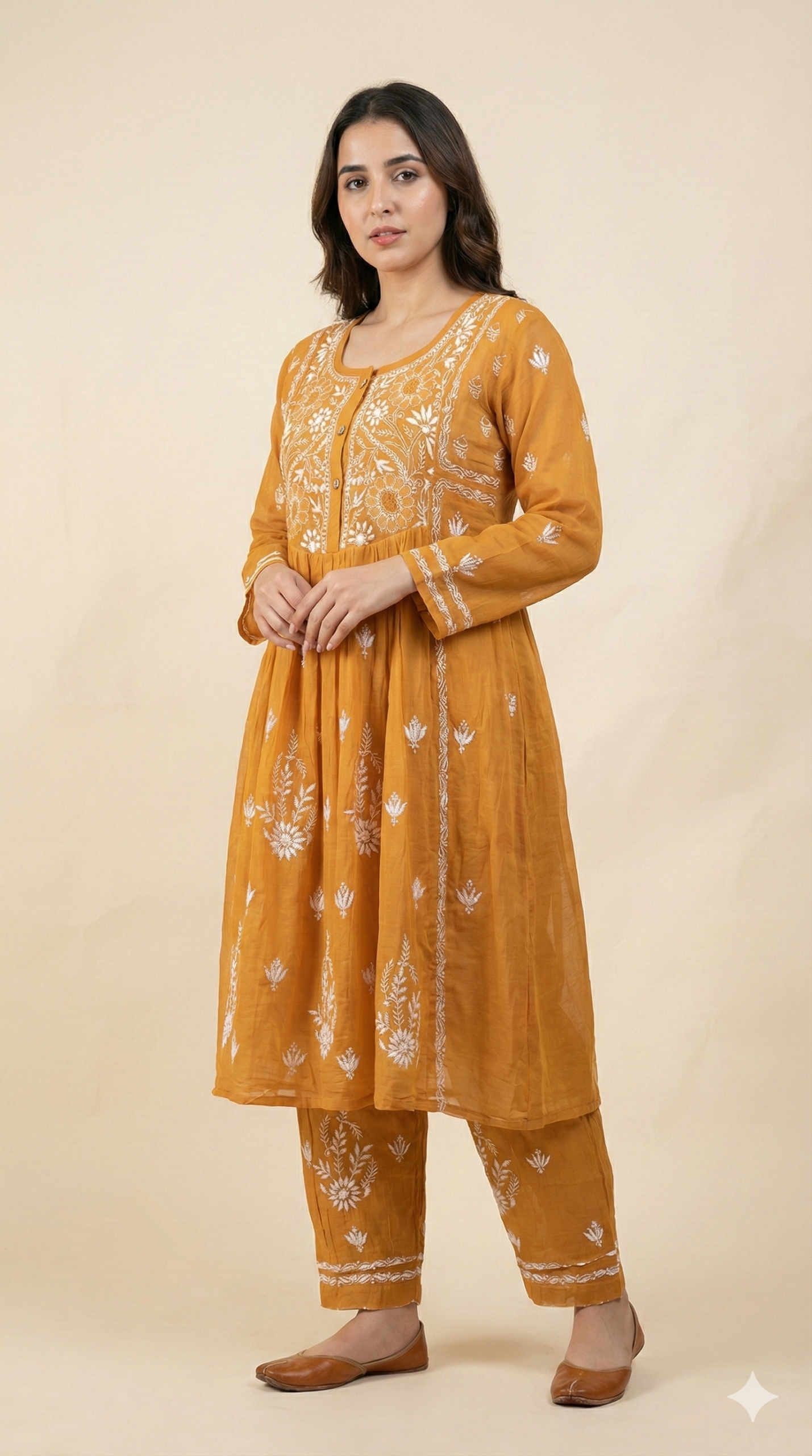 Mustard yellow Lucknowi Chikankari kurti set with white hand embroidery and matching pant